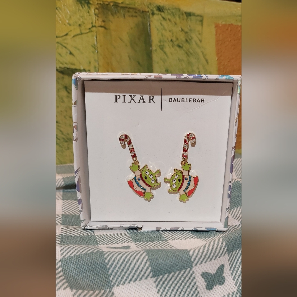 BaubleBar Pixar Alien Candy Cane Earrings